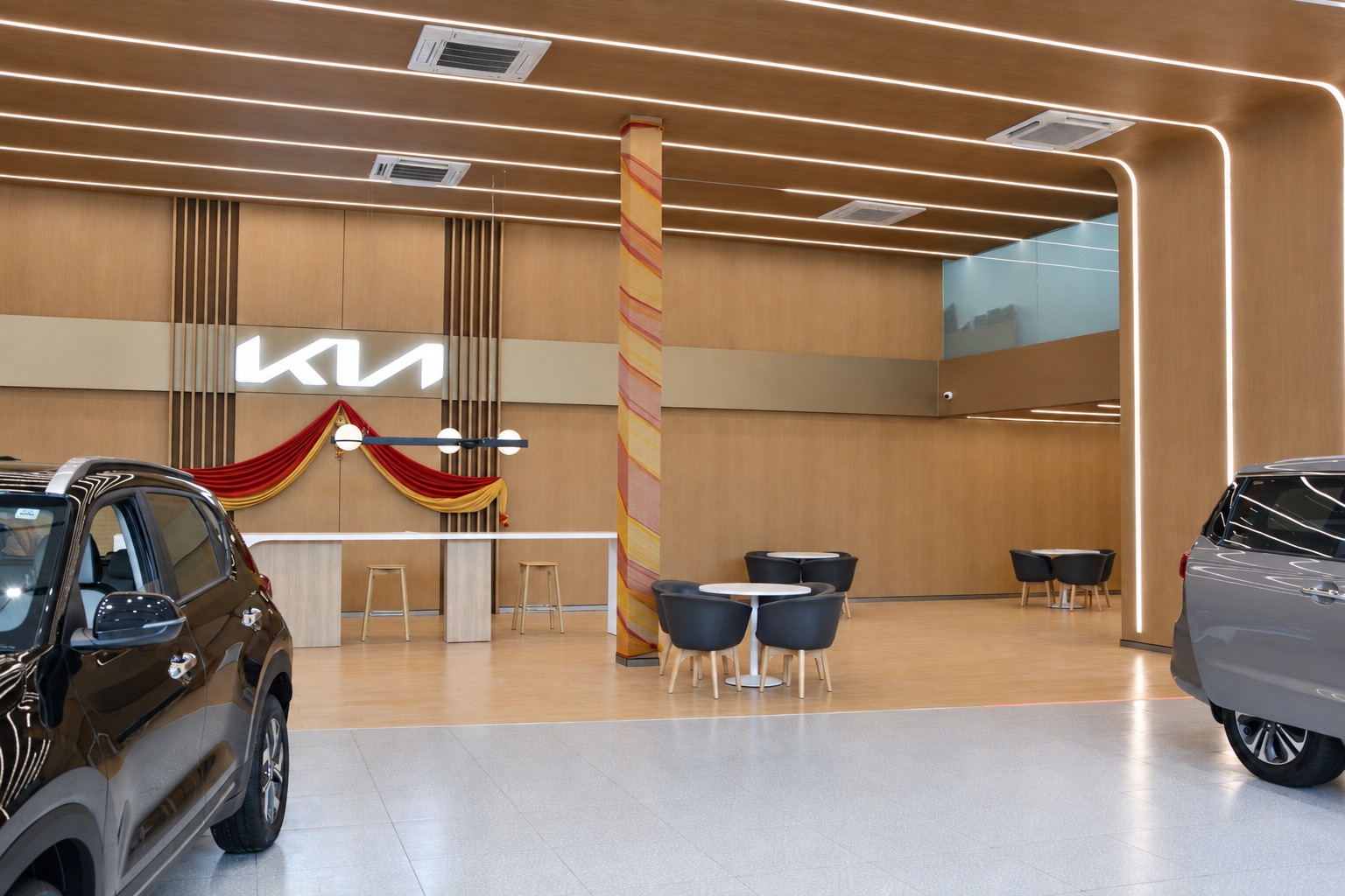 KIA showroom — main display space, reception and wood-grain interior surfaces.